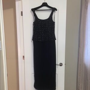 Elegant Black Sleeveless Dress
Final sale